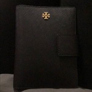 Tory Burch passport wallet. Only used once.